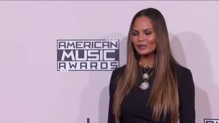 Chrissy Teigen and John Legend Fashion  AMAs 2016 [upl. by Ycniuq244]